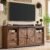 JXQTLINGMU Farmhouse TV Stand for 75+ Inch TV, 32″ Tall Entertainment Center w/4 Drawers & Sliding Barn Door, Rustic Media Console w/Storage Shelves, 66″ Wood Television Stand for Living Room, Brown